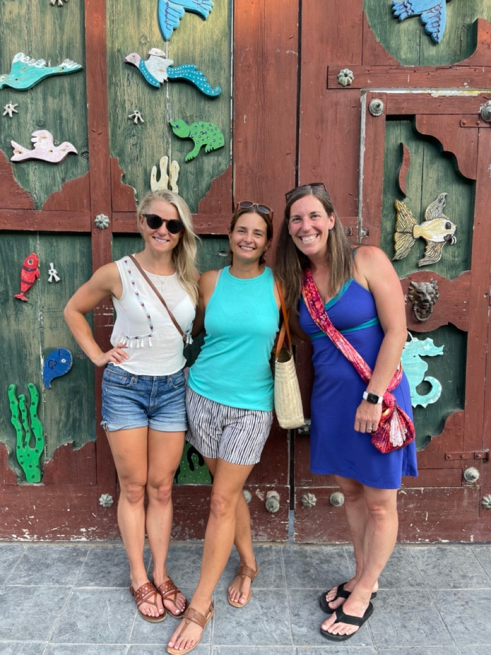 woman wearing waypoint goods travel scarf with 2 other women