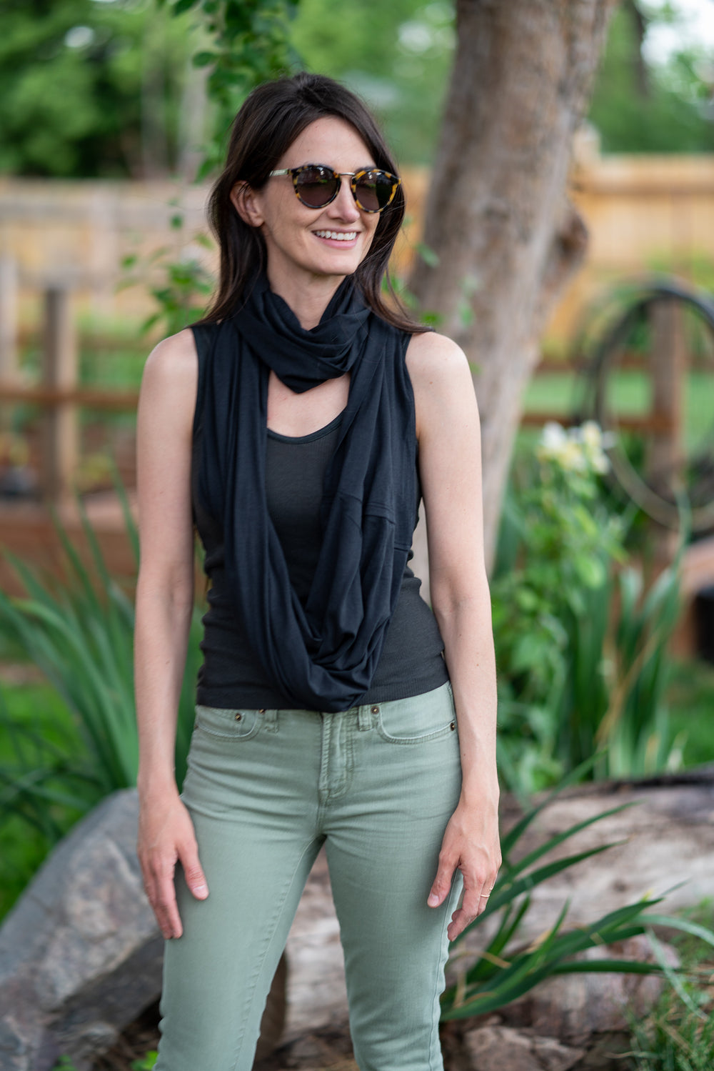 woman wearing black onyx carbon travel scarf
